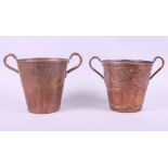 A Newlyn design copper two-handled jardiniere with embossed floral motifs, 7" high, and another