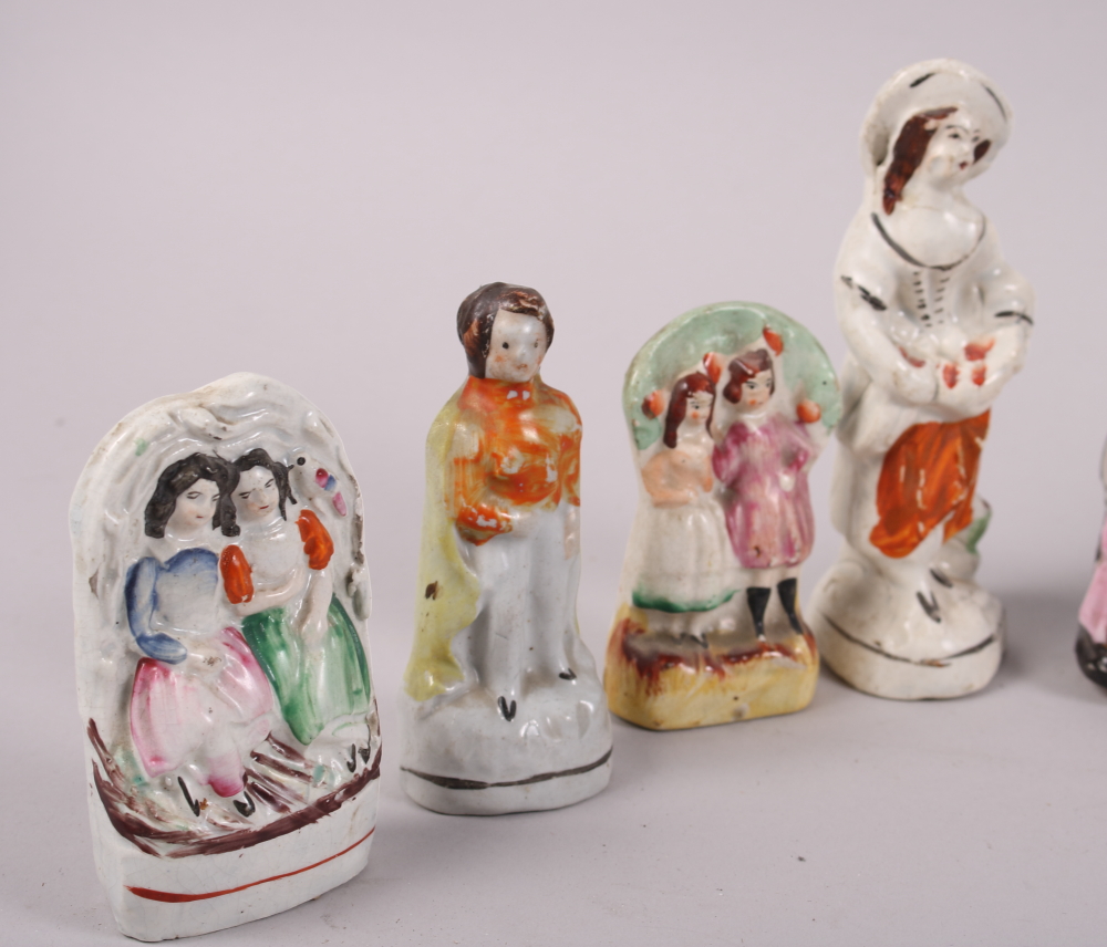 A 19th century Staffordshire figure, Faith, 4 1/2" high, and nine other similar Staffordshire - Image 2 of 7