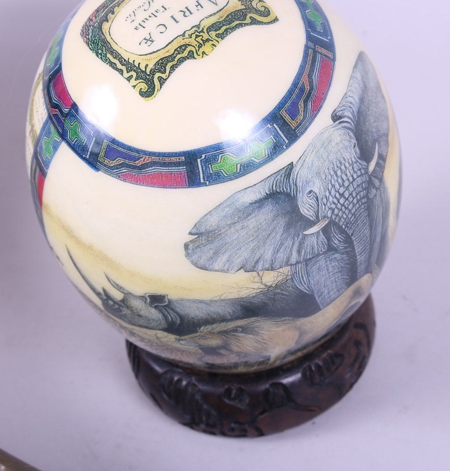 An ostrich egg, decorated with a map of Africa and indigenous animals, a carved buffalo horn and - Image 4 of 6