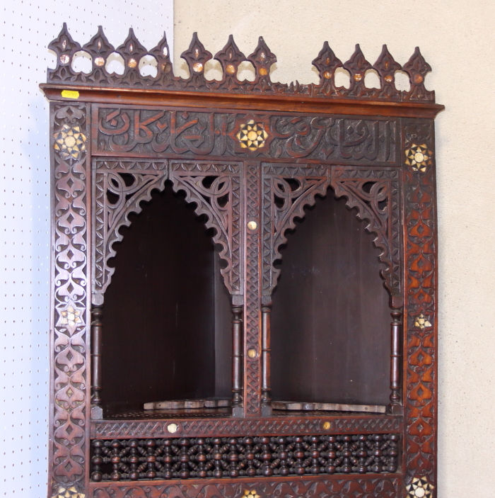 An antique Moorish floor standing corner cabinet, with script carved frieze, carved, turned and - Image 2 of 4