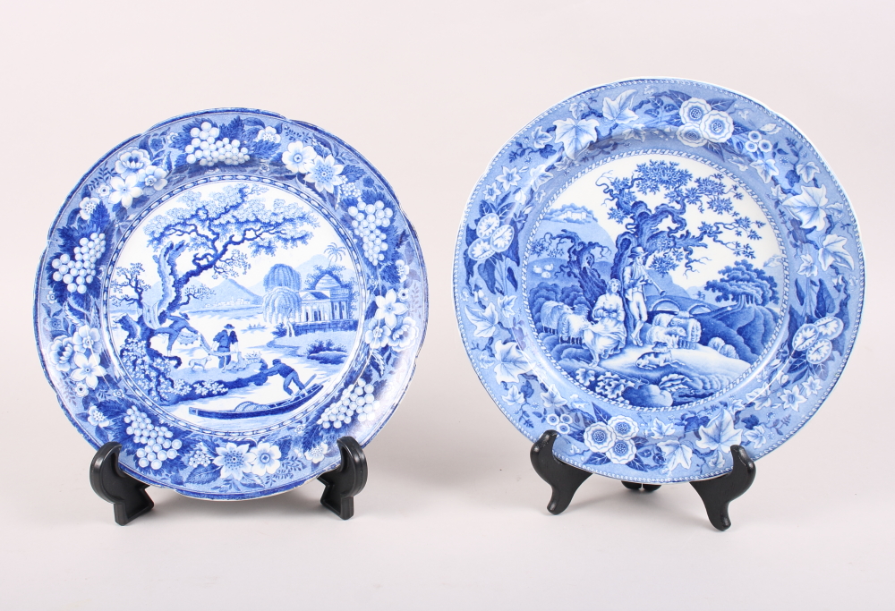 A 19th century blue and white plate, decorated shepherd and shepherdess resting under a tree, and