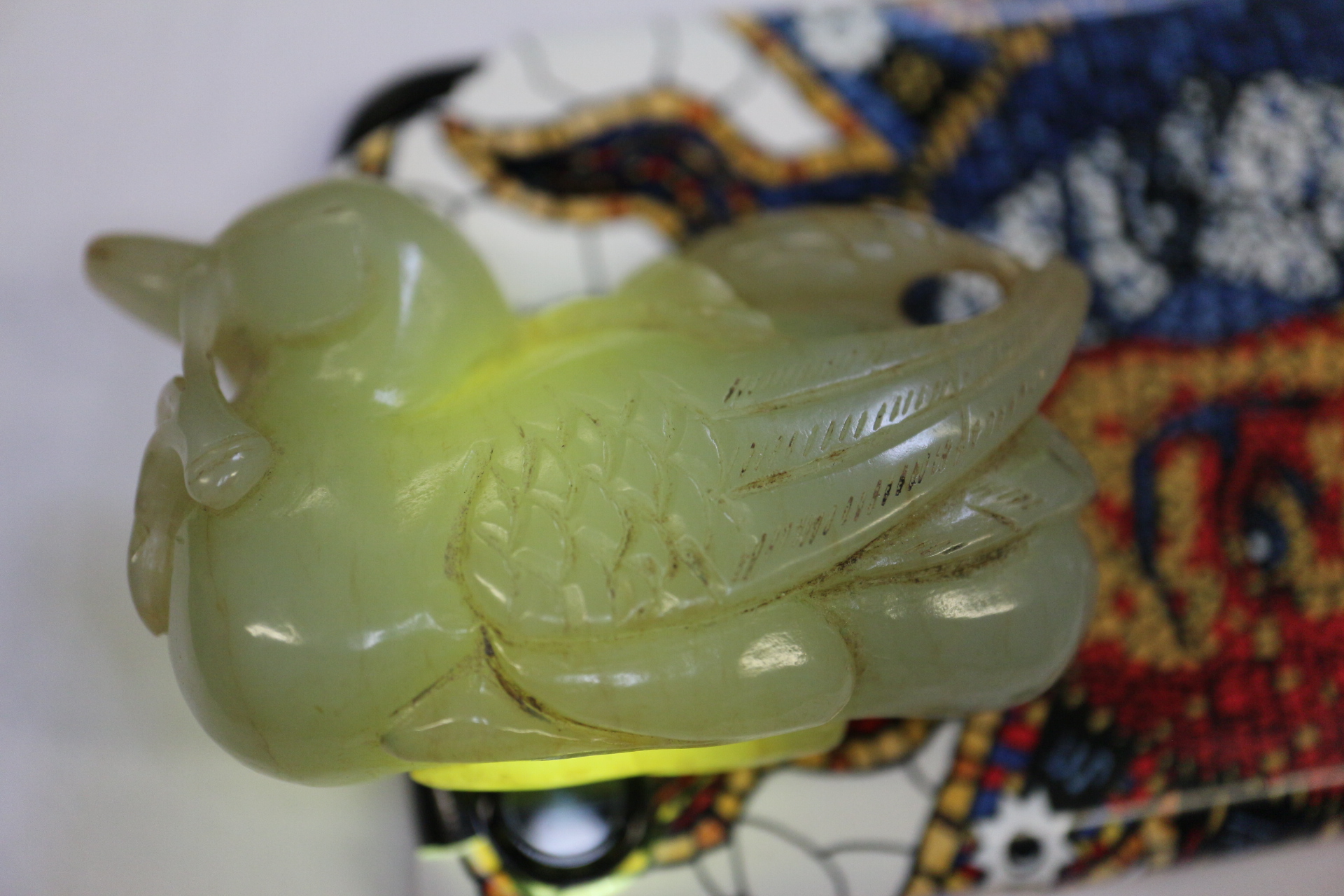 A Chinese carved pale celadon jade figure of a duck, 2 3/4" long, on associated carved hardwood - Image 17 of 22