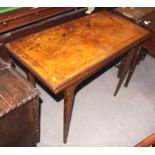 A 19th century figured walnut and inlaid fold-over top card table, on square tapered supports, 36"