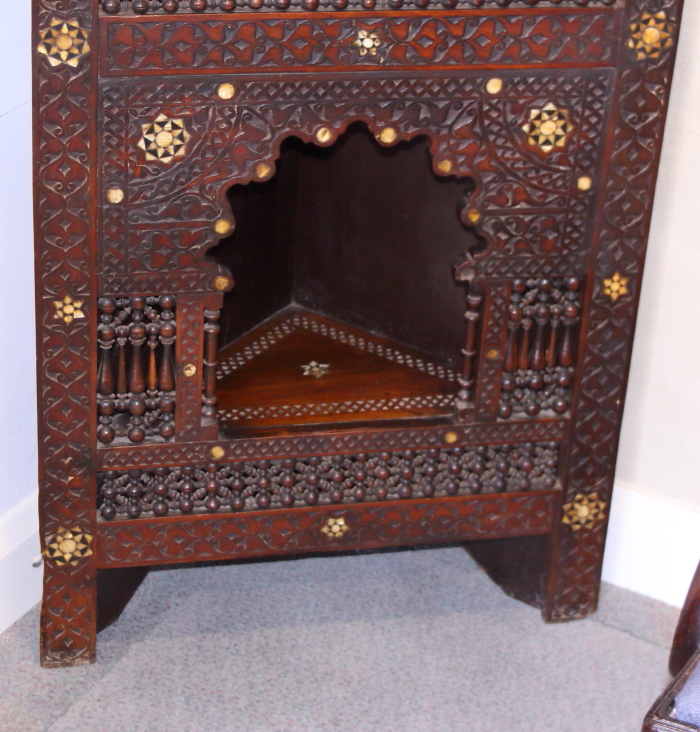 An antique Moorish floor standing corner cabinet, with script carved frieze, carved, turned and - Image 4 of 4