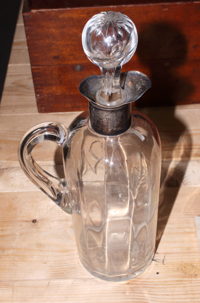 A glass whiskey bottle with silver collar, a white metal and inset Cairngorm desk weight, a metal - Image 2 of 2