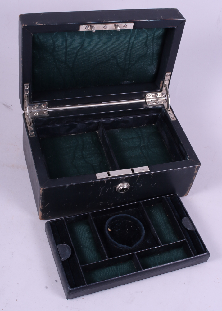 A "Russian" leather jewel box with fitted interior and Bramah lock, 8" wide