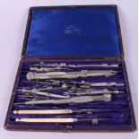 A set of draughtsmen's drawing instruments, in case