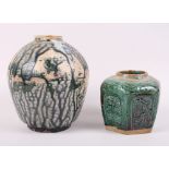 A Chinese "Ming" glazed pottery baluster vase and a similar smaller ginger jar