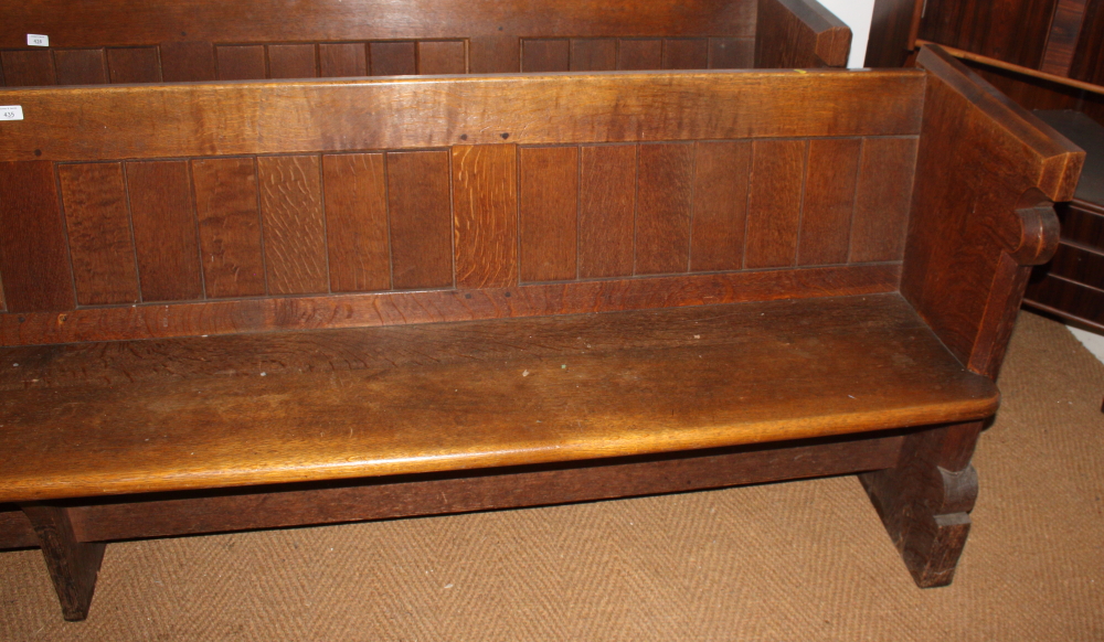 A carved oak pew with trefoil panel ends, 120" long - Image 2 of 3