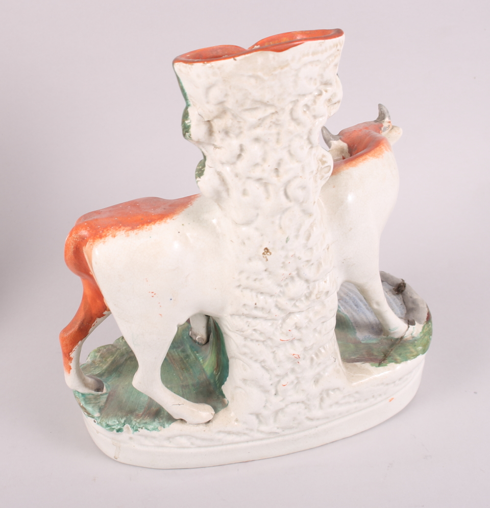 A pair of 19th century Staffordshire figures with cattle, 8 1/2" high, a cow and calf spill vase, 11 - Image 6 of 12
