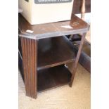 A 1930s oak octagonal two-tier book table, 20" square