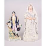 A 19th century Staffordshire figure, Queen Victoria 1897, 17" high, and a similar figure, Robbie
