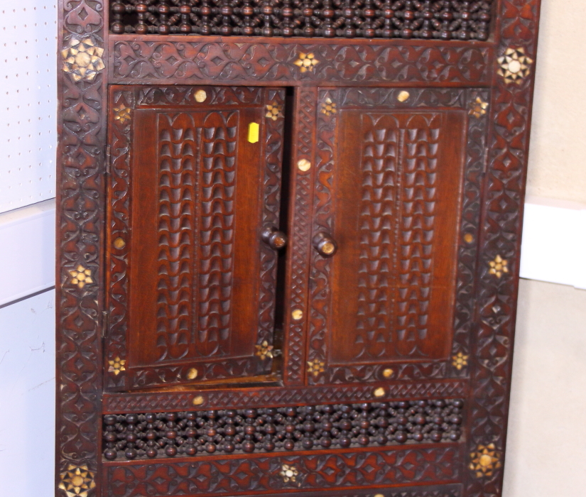 An antique Moorish floor standing corner cabinet, with script carved frieze, carved, turned and - Image 3 of 4