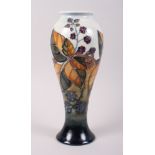 A Moorcroft baluster "Blackberry" pattern vase, designed by Sally Tuffin, 10 3/4" high