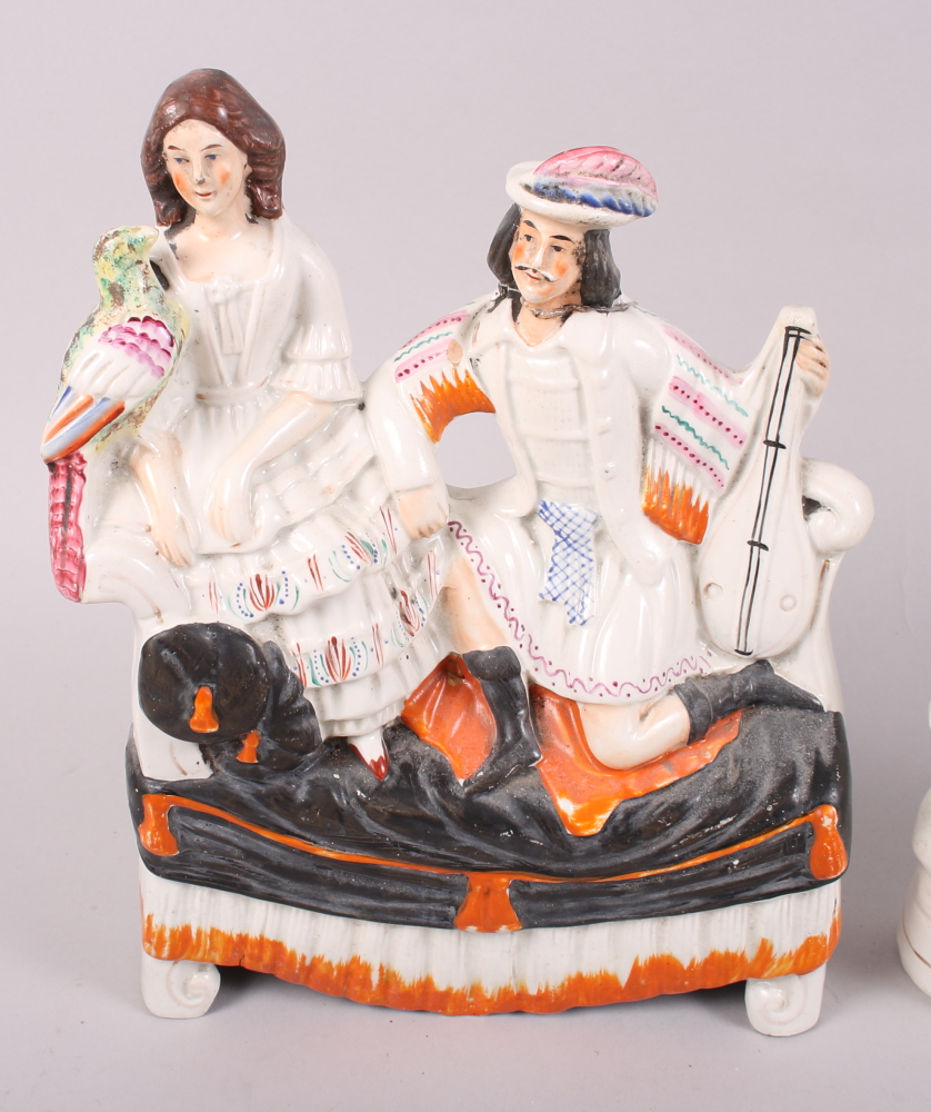 Two 19th century Staffordshire figure groups, an Uncle Tom Staffordshire figure and another group, - Image 5 of 14