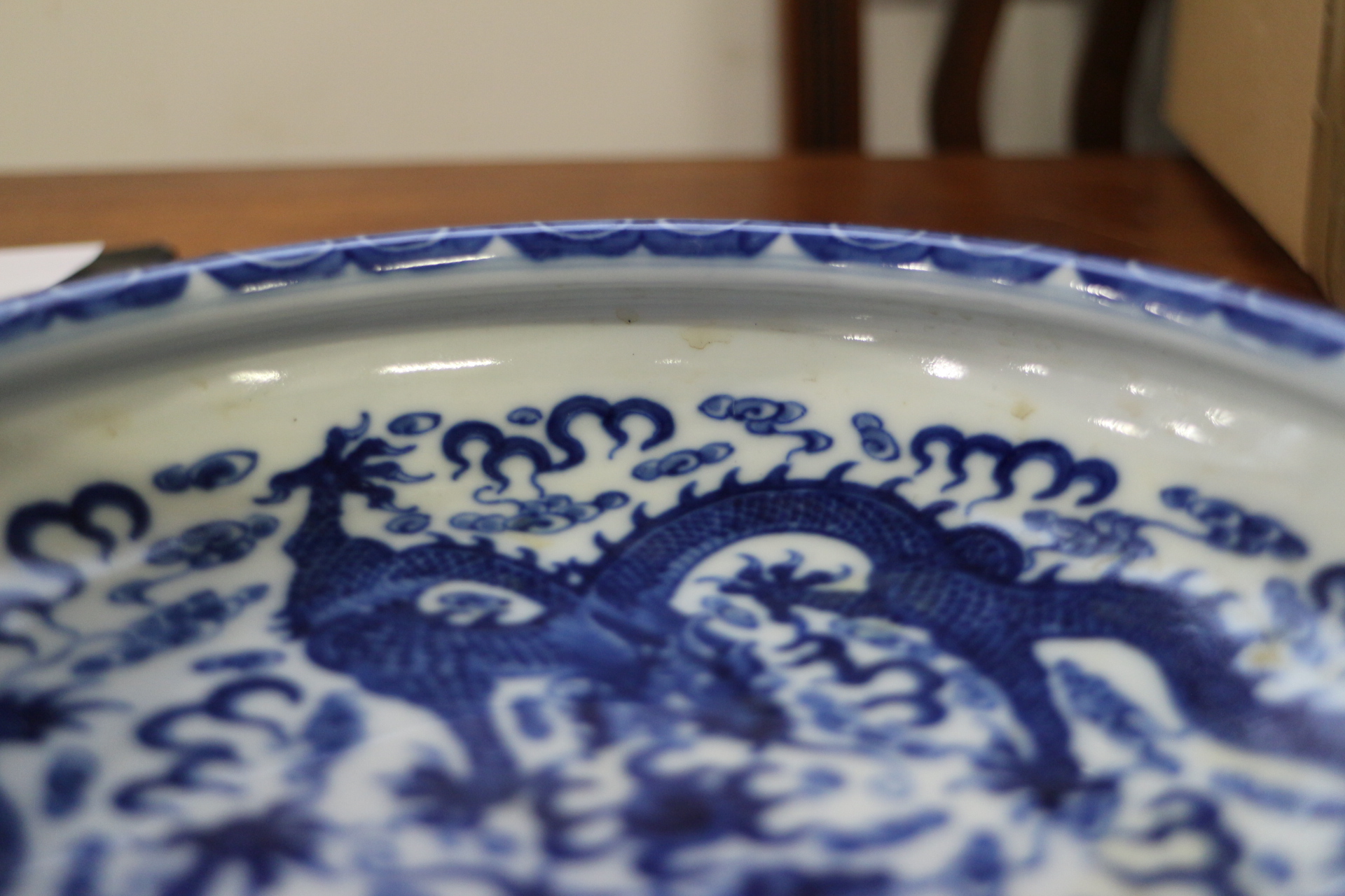 A Chinese blue and white porcelain shallow dish, decorated two dragons and clouds, seal mark to - Image 8 of 8