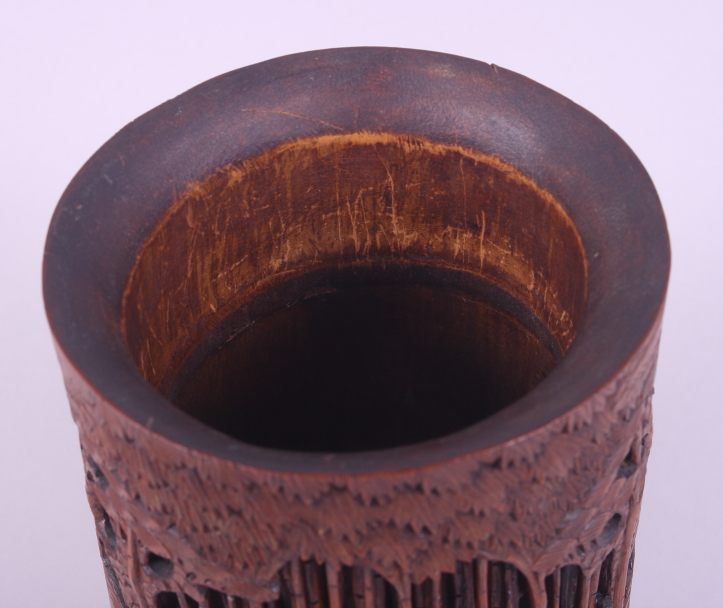 A Chinese bamboo brush pot, deeply carved with figures in a bamboo grove, 8" high - Image 2 of 4
