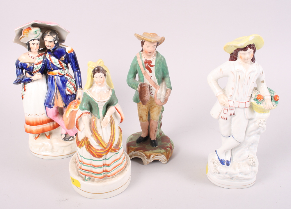 A 19th century Staffordshire figure, fish wife, a smaller figure, Spanish lady, and five other - Image 5 of 7