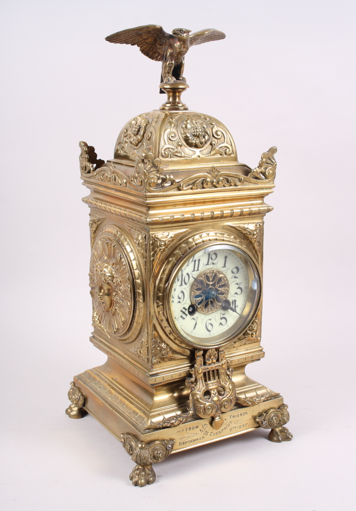 A late 19th century Renaissance Revival brass cased mantel clock with eagle surmount, 16" high