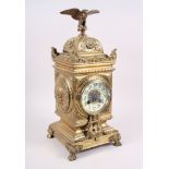 A late 19th century Renaissance Revival brass cased mantel clock with eagle surmount, 16" high