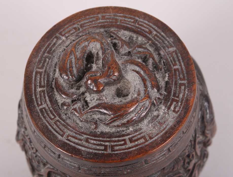 A Chinese carved hardwood drum-shaped box and cover, decorated dragons, 6" high - Image 4 of 6