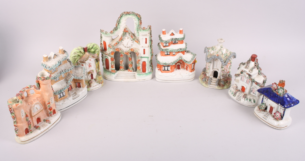 A 19th century Staffordshire cottage money box, 6" high, and seven other 19th century