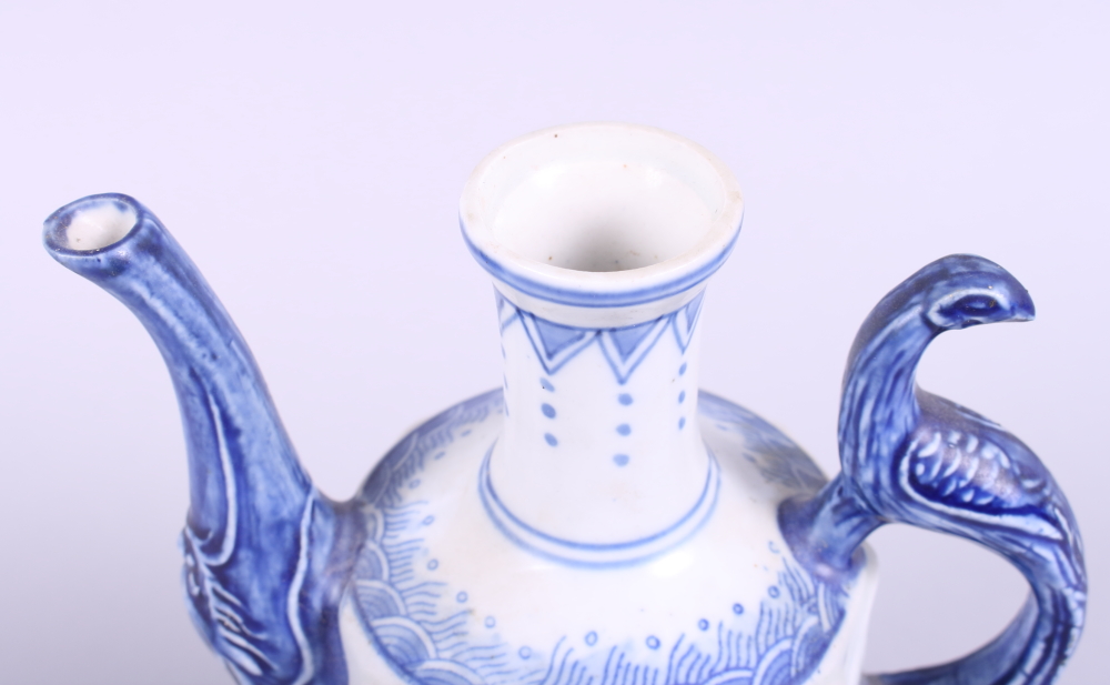 A Chinese blue and white wine pot, decorated plants, with seal mark to base, 7 1/2" high - Image 2 of 3