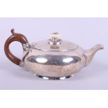 A bachelor's silver squat shaped teapot with wooden handle and ivory finial, 7.1oz troy approx