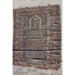 A Persian tribal prayer rug with all-over design on a dark blue ground, 44" x 56" approx (worn)