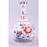 A Chinese Imari palette juglet, 9 1/2" high (restored)