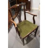 A set of eight mahogany dining chairs of mid 18th century design with pierced bar splats and drop-in