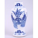 A Chinese blue and white oviform vase, decorated with characters around a table, 7" high