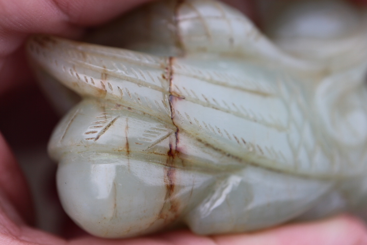 A Chinese carved pale celadon jade figure of a duck, 2 3/4" long, on associated carved hardwood - Image 3 of 8