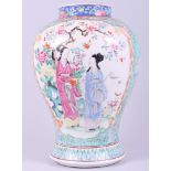 A 19th century Chinese porcelain polychrome enamel vase with figured panels, 10 1/2" high