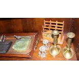 A copper tray, a pair of brass candlesticks, two glass inkwells, an onyx ashtray with pheasant,