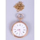 A Continental yellow metal open faced fob watch with white enamel dial and Roman numerals