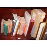 A collection of books, including a number of "What Katy Did" vols, two atlases, Royal memorabilia, a