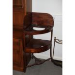 A 19th century mahogany bowfront corner wash stand, fitted one drawer, on splay supports, 24" wide