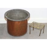 A copper log bin, 18 1/2" dia, and a brass trivet, 9 3/4" wide