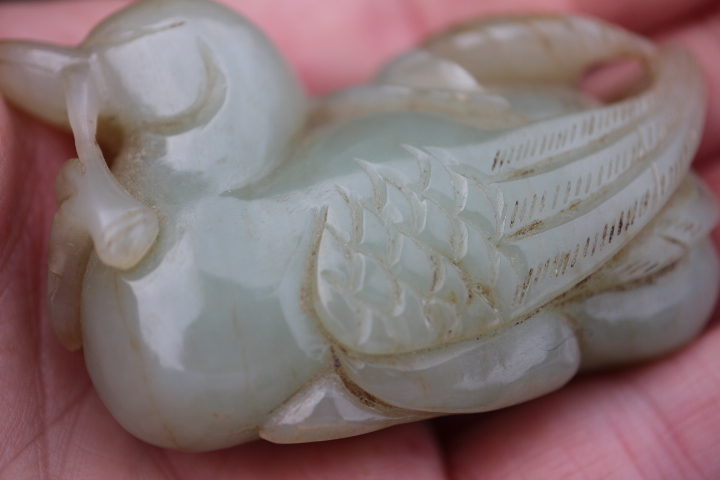 A Chinese carved pale celadon jade figure of a duck, 2 3/4" long, on associated carved hardwood - Image 2 of 8