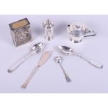 A silver mustard pot, a silver pepperette, a silver match box cover, two silver spoons,