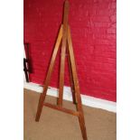 A polished as walnut easel