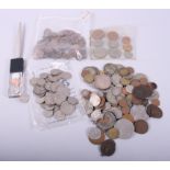 A quantity of mostly English coins, including Winston Churchill commemorative crowns, and a letter
