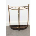 A brass semi-circular umbrella stand, 18" wide