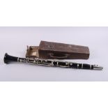 A hardwood clarinet, in leather case, 26 1/2" long, and an Honourable Artillery Company swagger