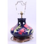 A Moorcroft "Anemone" pattern table lamp with shade, 8 3/4" high