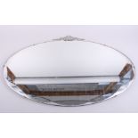 An oval bevelled glass mirror, 27" wide