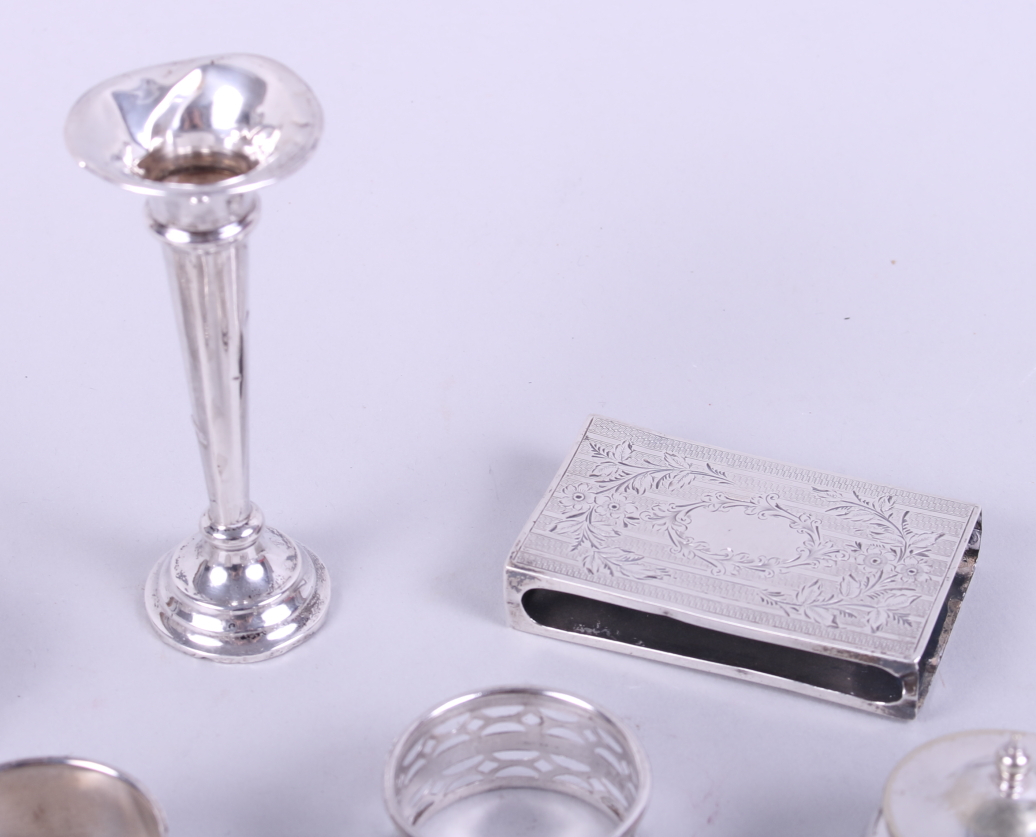 Two silver napkin rings, a silver fork, a silver spoon, a silver match box sleeve, a miniature - Image 4 of 4