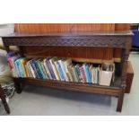 A largely 17th century carved oak two-tier buffet with a lunette frieze, on stile supports, 70" wide