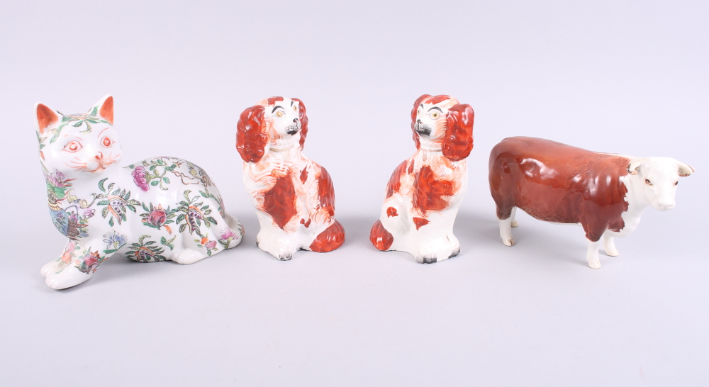 A Beswick model of a champion bull, a pair of Staffordshire spaniels and a Chinese porcelain famille